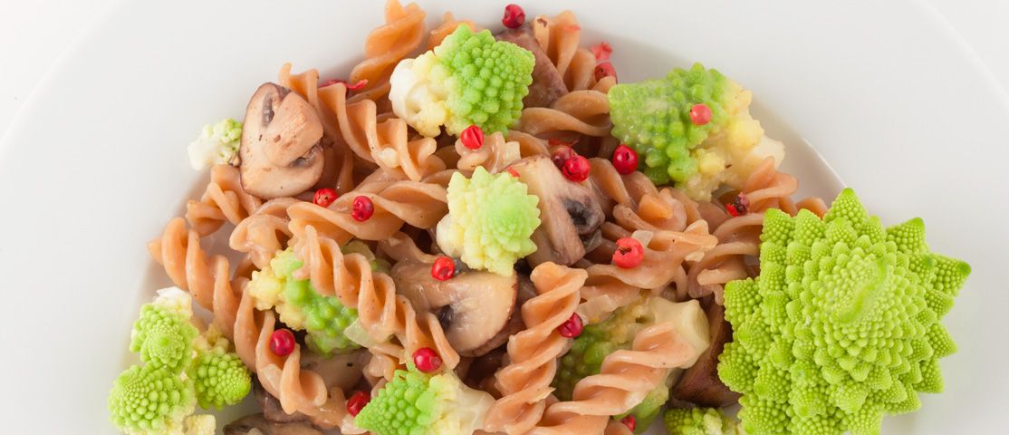 Red lentil pasta with romanesco and mushrooms