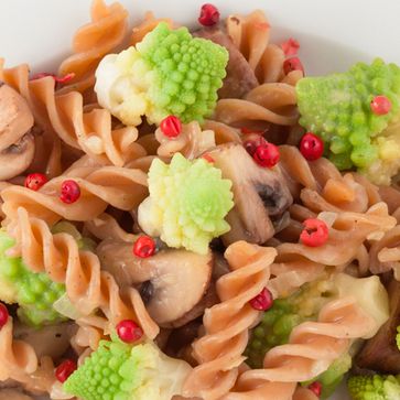 Red lentil pasta with romanesco and mushrooms